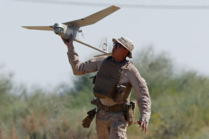 Soldier holding a jammer drone