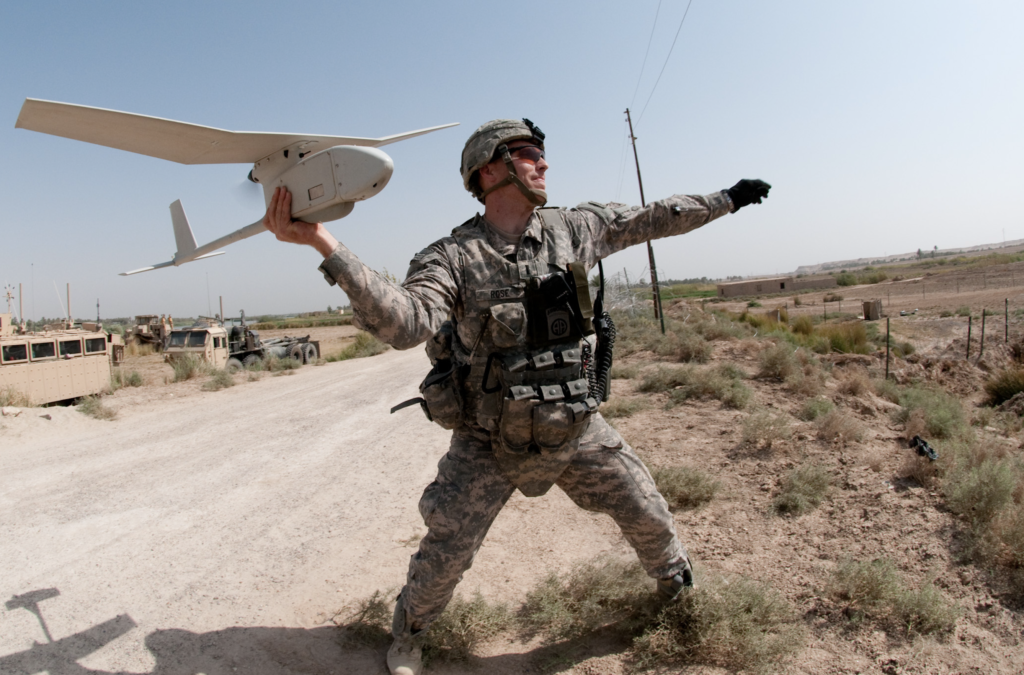 Launching a small military drone by hand