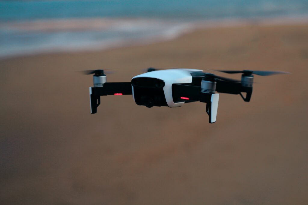 drone hovering on a beach