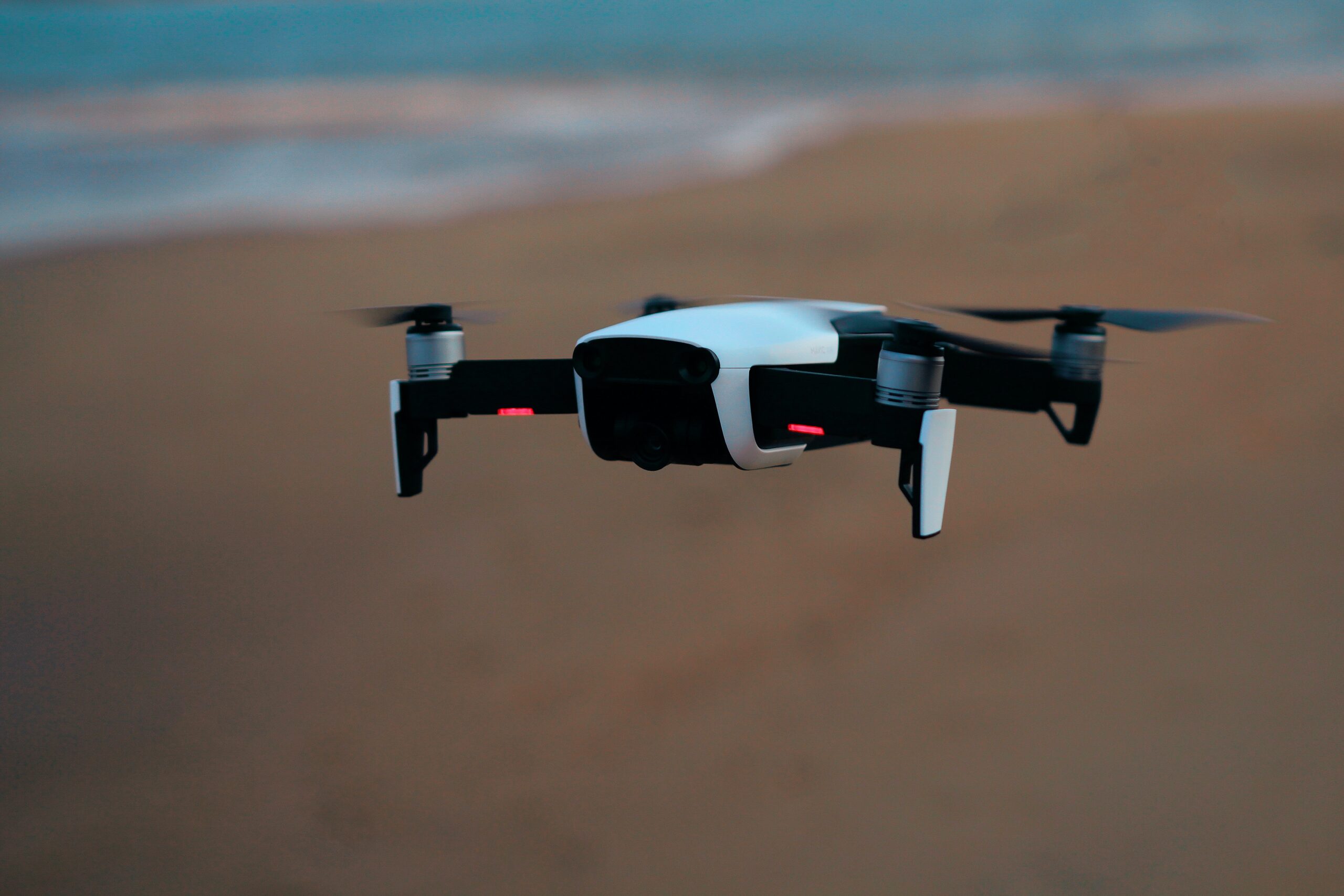 drone hovering on a beach