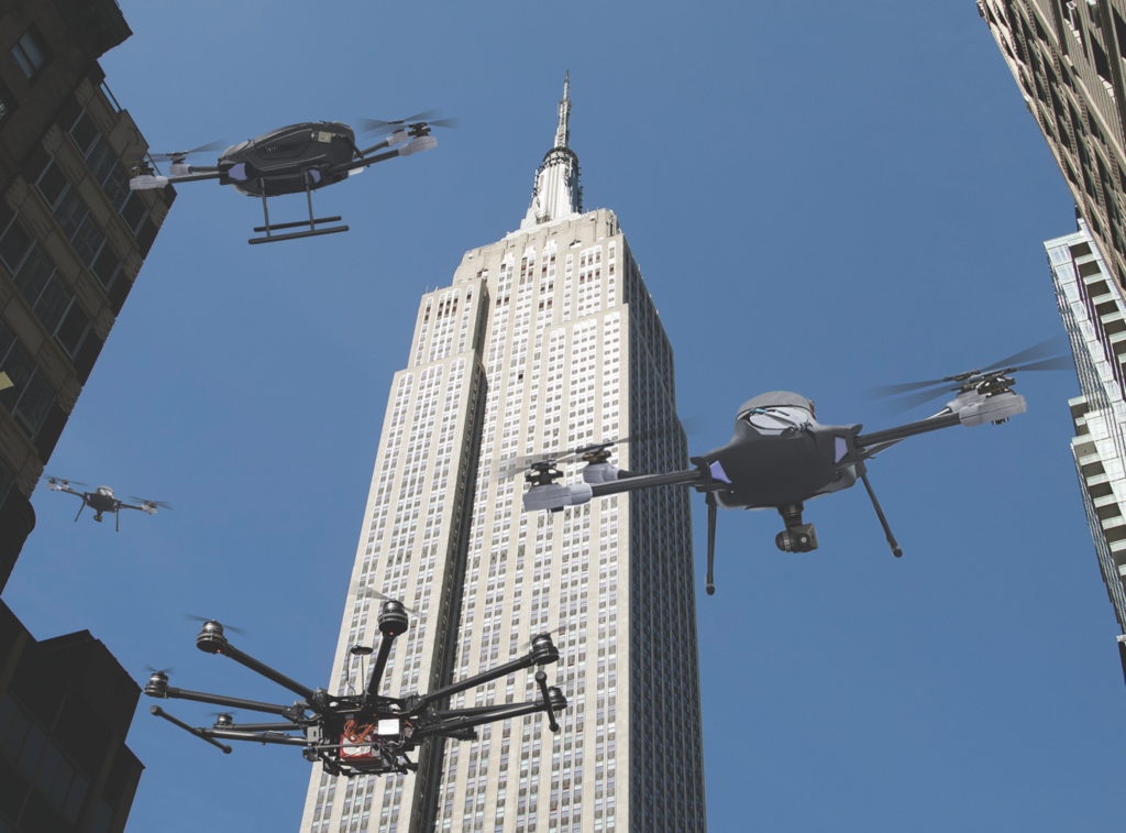 different drones flying by empire state building